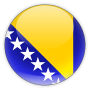 A circular icon depicting the flag of Bosnia and Herzegovina, with a yellow triangle adjacent to a diagonal row of white stars against a blue background