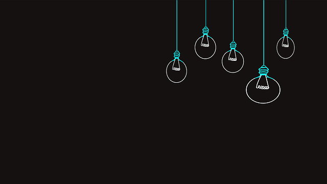 Four hanging light bulbs with one lit up, representing ideas, support services, or client enlightenment offered by a company