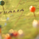 A close-up shot of pins in a physical map of Australia