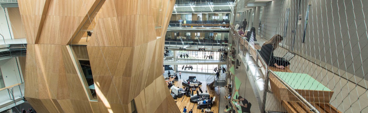 An interior shot of the modern, multi-level library at the Melbourne School of Design at the University of Melbourne